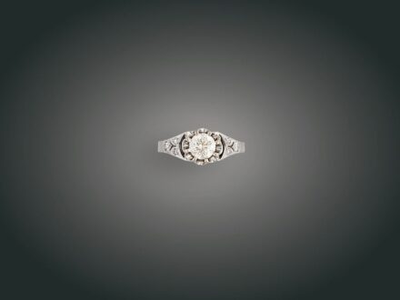 186. tétel, Gyűrű, 18 k au, 7 bril. cca. 1,10 ct, 5,8 g