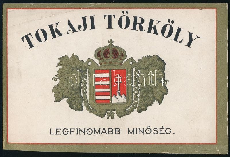 Tokaji Törköly legfinomabb minőség címke, egyik sarkán hajtásnyomokkal