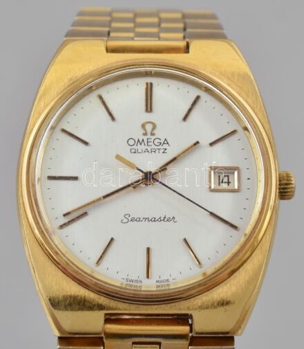 OMEGA Seamaster férfi karóra 1970 körül, quartz szerkezettel, analóg kijelzős, dátumfunkciós, működik, kopott, karcos, aranyozott fémszíjjal, működik, de nem jár pontosan d: 35mm