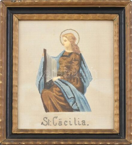 Dekoratív üvegezett fakeret, benne Szent Cecília a zene védőszentje gyöngygobelin. 27x23cm