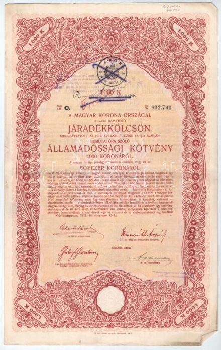 Budapest 1917. 'A magyar korona országai 6%-kal kamatozó Járadékkölcsön' államadóssági kötvénye 1000K-ról, szelvényekkel, bélyegzéssel és szárazpecséttel (2x) áthúzással érvénytelenítve T:III az egyik lap szélén apró