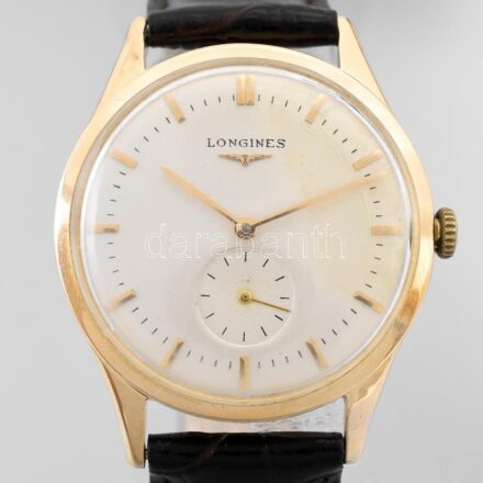 Longines 18K arany, kézi felhúzós, férfi karóra, Z23 szerkezettel. Jelzett tok, jelzett 17 köves szerkezet, számlap egy részén enyhe elszíneződés, új bőr szíjjal. működő, jó állapotban d: 35 mm