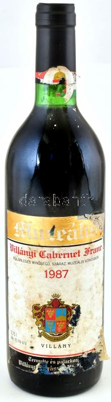 1987 Villányi Borászat Rt. Muzeális Villányi Cabernet Franc, szakszerűen tárolt bontatlan palack száraz vörösbor, 12.1%, kopott, foltos, sérült címkével, 0,75l.
