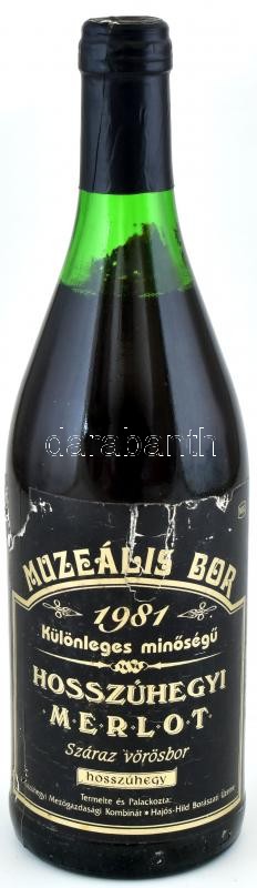 1981 Hosszúhegyi Merlot 1981, muzeális bor, hajós-bajai borvidék, szakszerűen tárolt bontatlan palack vörösbor, kopott, kissé sérült címkével, 0,75l.