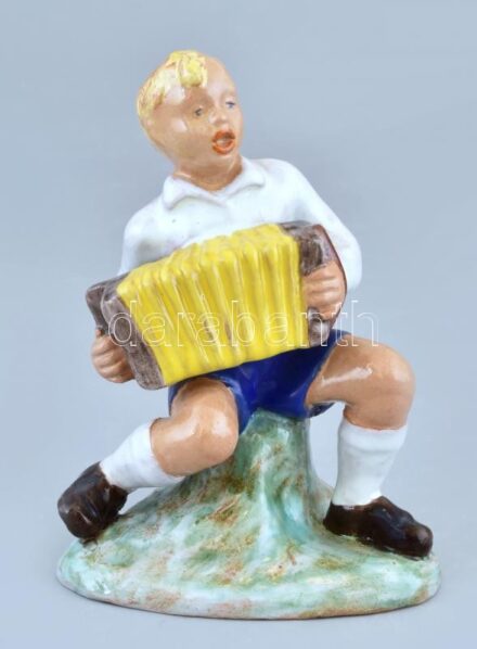 Olvashatatlan jelzéssel: Art Deco harmonikázó fiú. Mázas kerámia, kopásnyomokkal, m:14,5cm