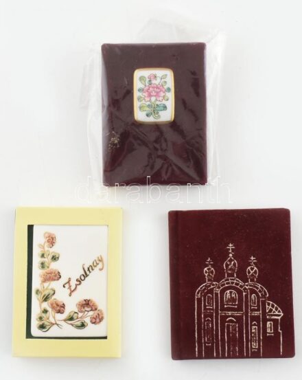 Hárs Éva: Zsolnay. Bp., 2006, Helikon. Kiadói bársony-kötés, porcelán plakettel, jó állapotban, papír tokban. / Dr. Sikota Győző: Herendi porcelán. Bp., 1987, Műszaki Könyvkiadó. Kiadói plüss kötés, Siang-Noir-mintás porcelán