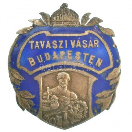 ~1920. 'Tavaszi Vásár Budapesten' zománcozott gomblyukjelvény, kék zománccal (33x29mm) T:1- / Hungary ~1920. 'Tavaszi Vásár Budapesten (Spring Fair in Budapest)' enamelled buttonhole badge with blue enamel (33x29mm) C:AU