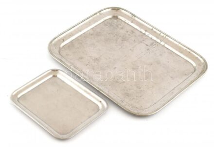 2 db alpakka kávéházi tálca, egyik jelzett, kisebb horpadásokkal, kopásnyomokkal, 22×27 és 38×51 cm