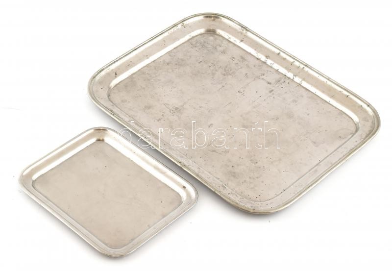 2 db alpakka kávéházi tálca, egyik jelzett, kisebb horpadásokkal, kopásnyomokkal, 22×27 és 38×51 cm