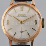 Doxa női arany (Au/14k) karóra, működik, szép állapotban, bőr szíjjal, br:13 g, d:23mm