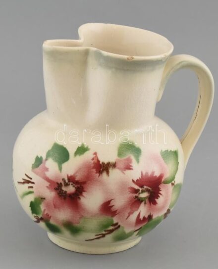 Fischer Emil virágmintás fajansz kancsó, jelzett, mázrepedésekkel, néhány csorbával, m: 17,5 cm