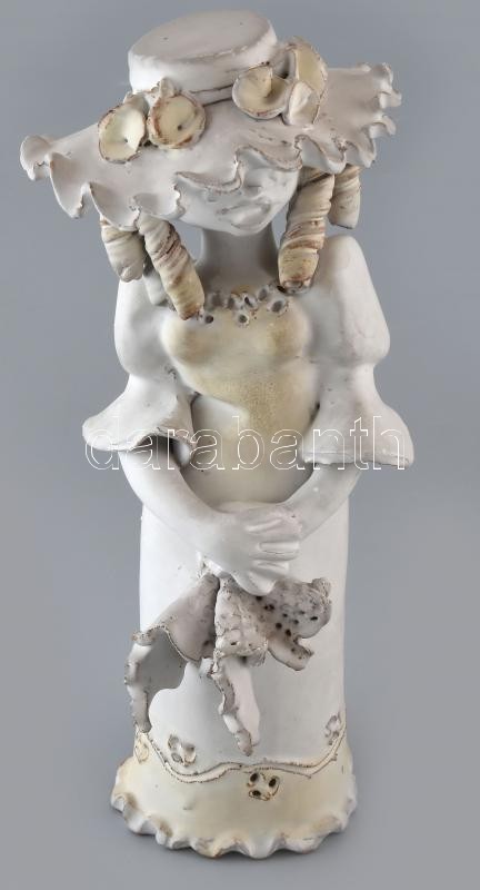 Kovács Éva (1938-): Kendős lány. Kézzel festett mázas kerámia, jelzett, mázhibákkal, m:35 cm
