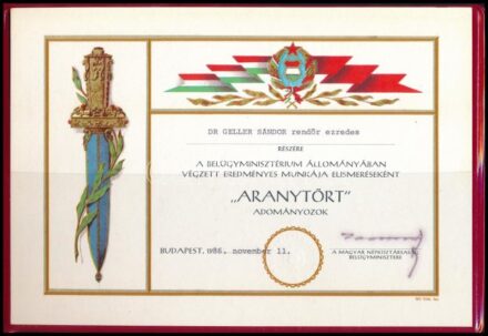 1986 'Aranytőr' adományozó oklevél Dr. Geller Sándor rendőrezredes részére, Kamara János (1927-2000) belügyminiszter saját kezű aláírásával, eredeti nylon díszmappában + 1996 Dr. Geller Sándor ny. rendőr vezérőrnagy részére