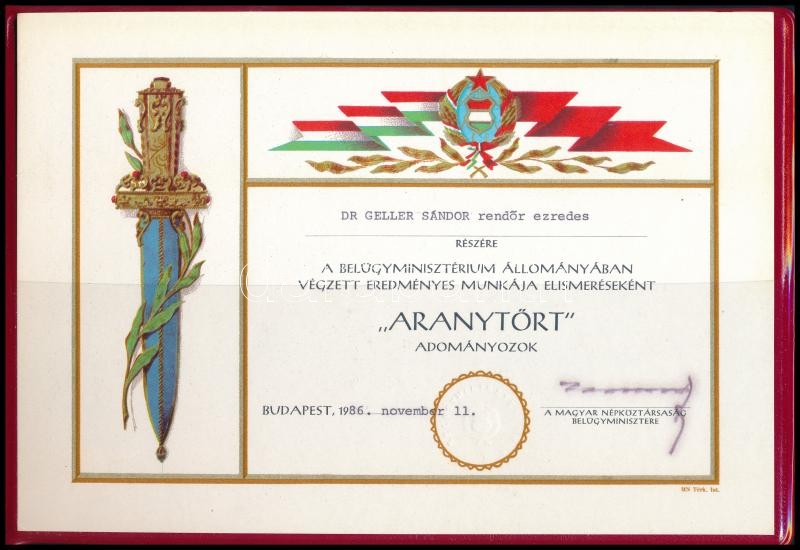 1986 'Aranytőr' adományozó oklevél Dr. Geller Sándor rendőrezredes részére, Kamara János (1927-2000) belügyminiszter saját kezű aláírásával, eredeti nylon díszmappában + 1996 Dr. Geller Sándor ny. rendőr vezérőrnagy részére