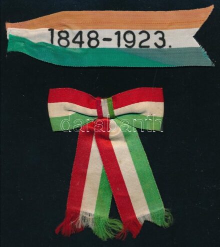 cca 1923-1956 Nemzeti szín szalag, '1848-1923' felirattal, 3x12 cm + Régi kokárda, a hátoldalán: '1896 N. K., 1956. X. 23., III. 15. K. M. J.' felirattal, kézi feliratozással, 8x6 cm