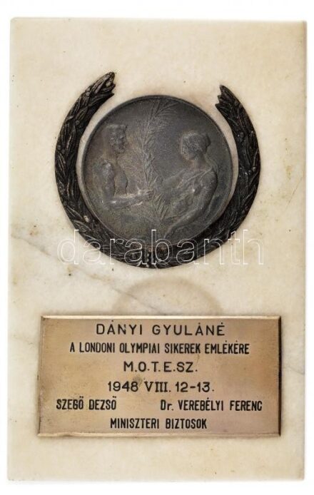 1948. 'Dányi Gyuláné - A londoni olympiai sikerek emlékére - M.O.T.E.SZ. 1948. VIII.12-13. - Szegő Dezső, Dr. Verebélyi Ferenc miniszteri biztosok' egyoldalas fém emlékérem márvány alapzaton (140x90mm) T:2- folt, a márvány több