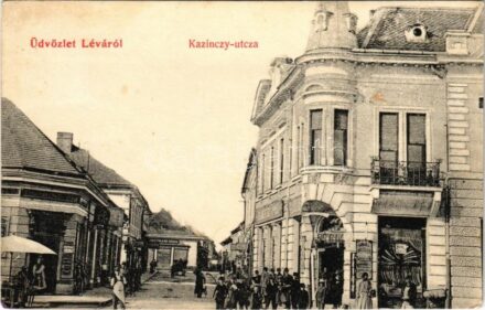 1907 Léva, Levice; Kazinczy utca, üzletek / street view, shops + 'G.BERZENCZE - P.NÁNA 87. SZ. B' vasúti mozgóposta bélyegző (r)