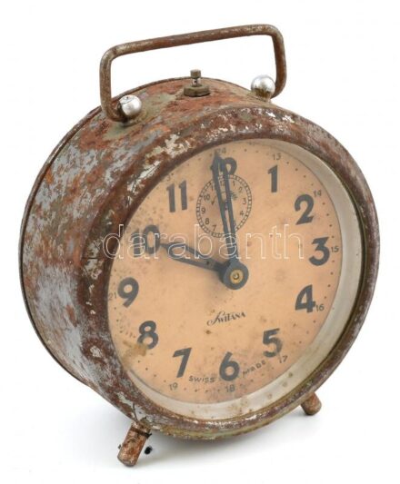cca 1950 Switana svájci ébresztős asztali óra, fém, rozsdafoltos, 11,5x9,5 cm / Vintage Swiss alarm clock, with rust stains