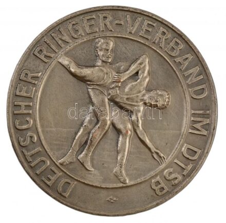 NDK ~1980. 'Német Birkózószövetség a DTSB-ben' kétoldalas, ezüstözött Br érem, zománcozott rátéttel (60mm) T:2 GDR ~1980. 'German Wrestling Association in the DTSB' two-sided, silvered Br medallion with enamelled applique (60mm) C:XF