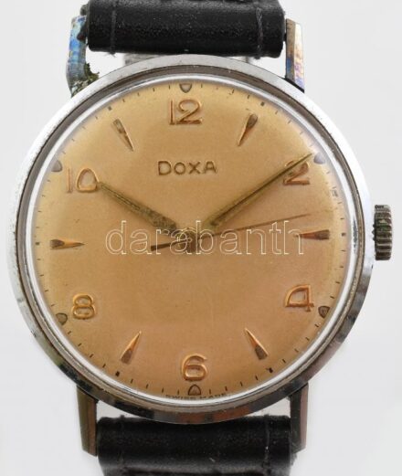 cca. 1960 Doxa mechamikus férfi karóra, szíjjal műkődő, korának megfelelő állapotban, számlapon apró pöttyök. d: 35mm
