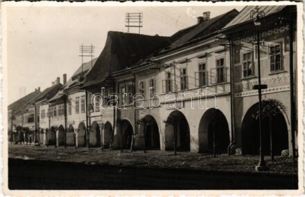 Beszterce, Bistritz, Bistrita; Fő tér, M. M. Molner üzlete / main square, shop. photo