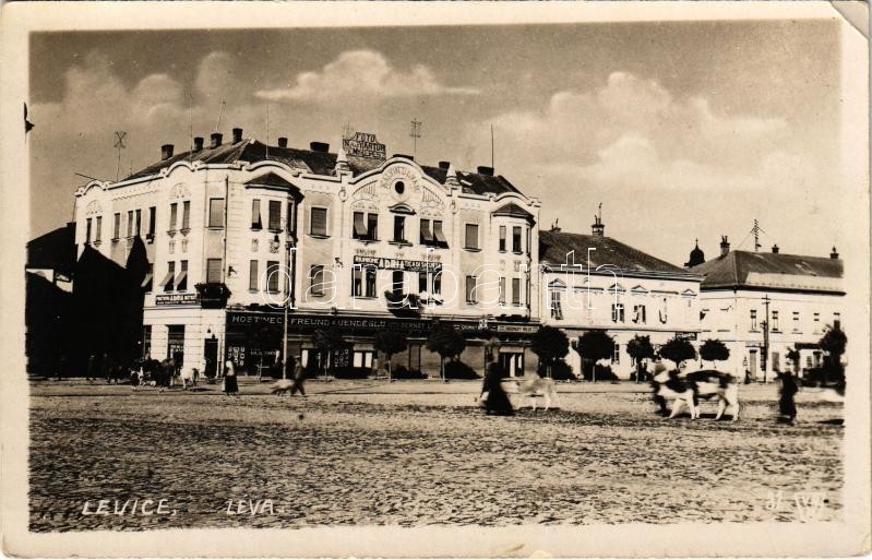 Léva, Levice; Fő tér, cukrászda, Kálvin Udvar, Nagy Artur fényképész, Vörösmarty Miklós, Grünhut Miksa, Bernát Link üzlete, Adria Biztosító főügynöksége, Freund vendéglő / main square, insurance company, shops, restaurant.