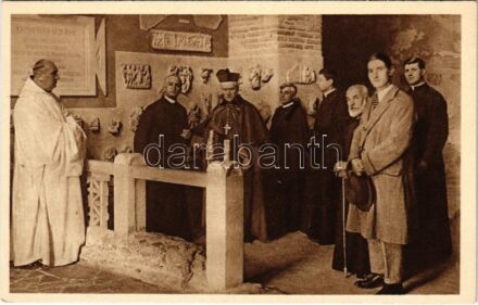 His Emin. Card. Archbishop Hayes of New York visiting the preserved Christian monuments in the 'Tricora Cell' above the Crypt of the Popes as illustrated by Mons. Wilpert