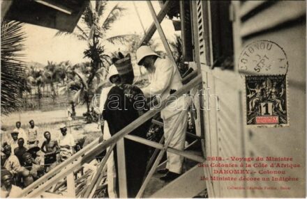 1909 Cotonou, Voyage du Ministre des Colonies a la Cote d'Afrique. Le Ministre décore un Indigene / Voyage of the Minister for the Colonies to the African Coast. The Minister decorates a Native. African folklore