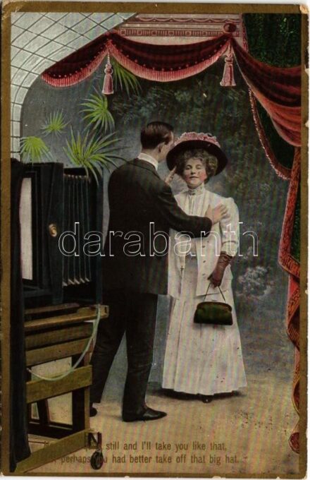 1909 'Now lady quite still and I'll take you like that, But perhaps you had better take off that big hat' Lady with photographer. Th. E. L. 'Theochrom' Serie No. 1095. (EK)