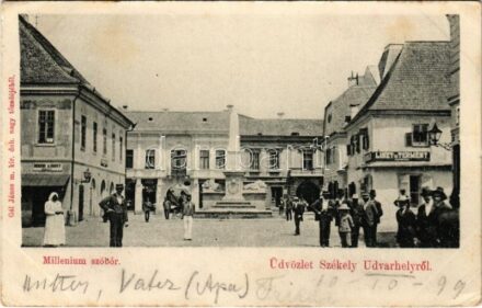 1899 (Vorläufer) Székelyudvarhely, Odorheiu Secuiesc; Millenium szobor, liszt és termény, Hodor Károly bádogos üzlete. Gál János kiadása / statue, shops (EK)