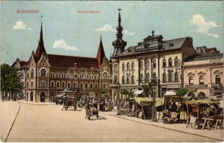 1914 Kolozsvár, Cluj; Széchenyi tér, piac, Bécsi élet és járadék biztosító, Wertheimer Vilmos, Gergely J. húsáruháza, Vlad János, Singer és Társa varrógépek üzlete, Modes Robes női divatterem / market, insurance company, shops,