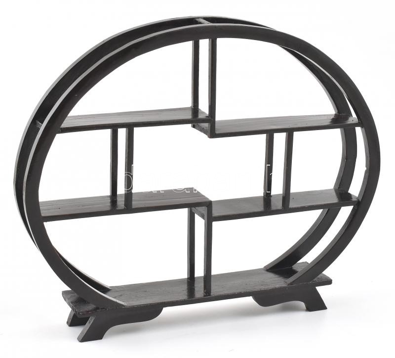 Fekete ovális, kisméretű, négy lábon álló polc, kisebb javított sérüléssel, 24x28x4,5 cm
