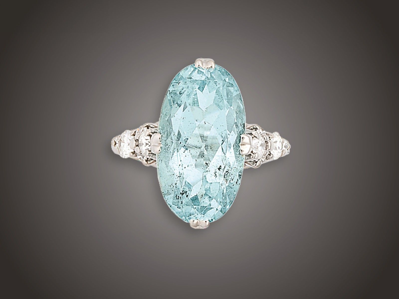 Gyűrű, 585 au, 1 akvamarin 7,42 ct, 10 bril. 0,55 ct, 5,5 g