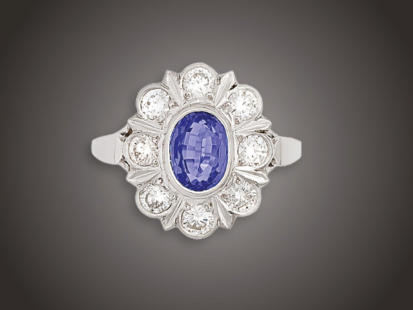 Gyűrű, 585 au, 1 zafír 1,38 ct, 8 bril. cca. 0,90 ct, 5,0 g