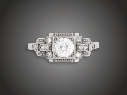 Gyűrű, 750 au, 1 bril. cca. 0,60 ct, 10 gyém. cca. 0,10 ct, 2,9 g