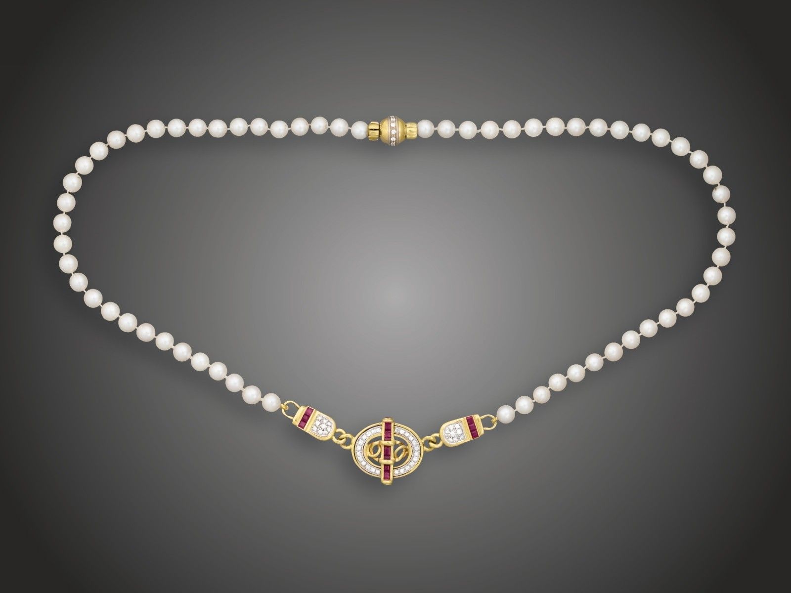 Nyakék, 750 au, t. gyöngy, 42 bril. cca. 0,80 ct, rubinok, br. 41,0 g