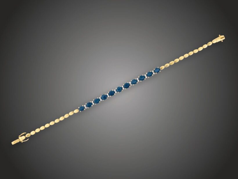 Karkötő, 750 au, 11 zafír cca. 5,6 ct, 20 bril. cca. 0,30 ct, 10,6 g 