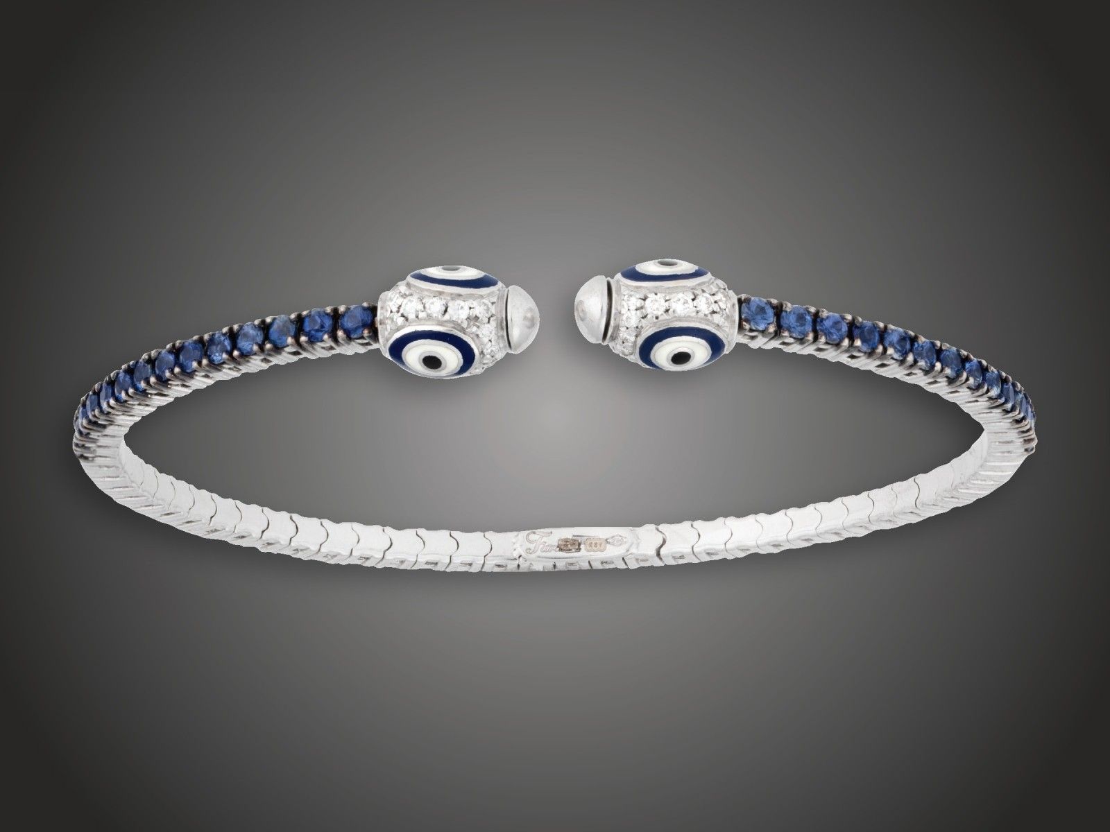 Karék, 750 au, 28 zafír cca. 1,10 ct, 50 bril. cca. 0,40 ct, 16,6 g