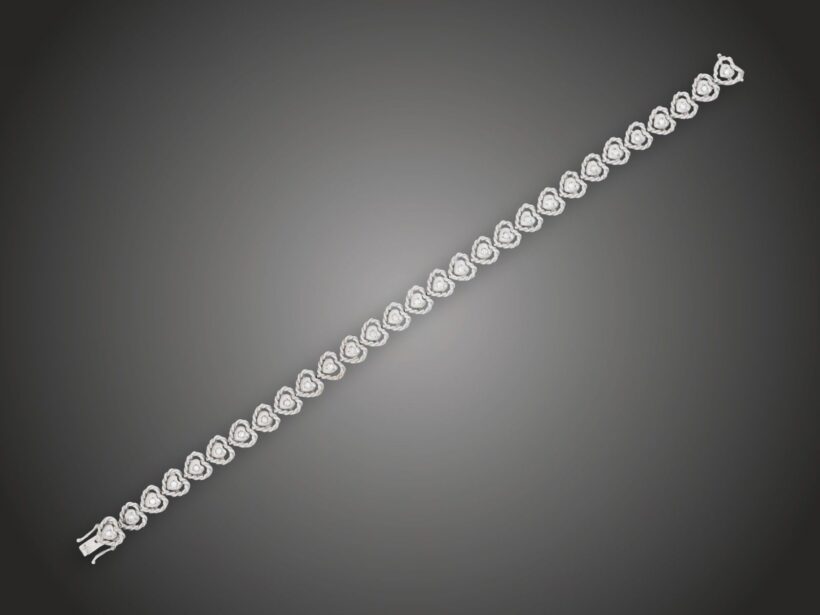 Karkötő, 750 au, 29 bril. cca. 0,45 ct, 18,7 g 
