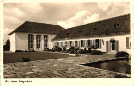 'Aus einem Fliegerhorst' / building of an German military airfield at unknown location (EK)