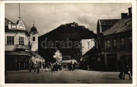 1941 Huszt, Chust, Khust; Fő utca, vár, Cikta, Treiber Adolf, Markovits Dávid, Práger üzlete, automobil / main street, castle, shops, automobile (EK)