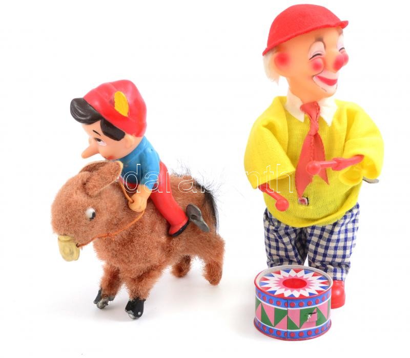 Kulccsal felhúzható dobos és lovas Pinokkió figurák. Működő, jó állapotban 14 cm, 19 cm