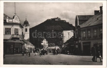 1941 Huszt, Chust, Khust; Fő utca, vár, Rádió villamossági cikke, vízvezeték és fürdősziba berendezések, Práger, Treiber Adolf üzlete / main street, castle, shops + kétnyelvű bélyegzés / bilingual cancellation
