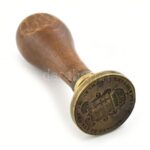 'Déjáky Emánuel mű takáts és gyárnok Budán'. Feliratos, magyar címeres pecsétnyomó. XIX. sz. eleje. d: 34 mm, m: 8 cm