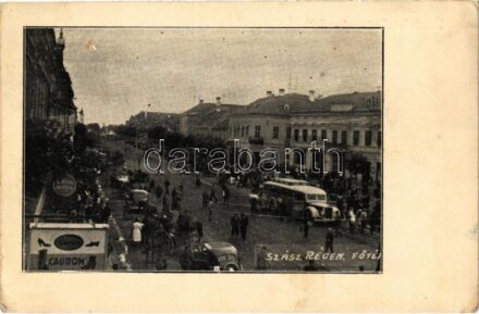 1940 Szászrégen, Reghin; Fő tér, Crema Nivea és Caurom cipőbolt, autóbusz. Üdvözlet a felszabadult Szászrégenből / main square, shops + 'visszatért' So. Stpl (EK)