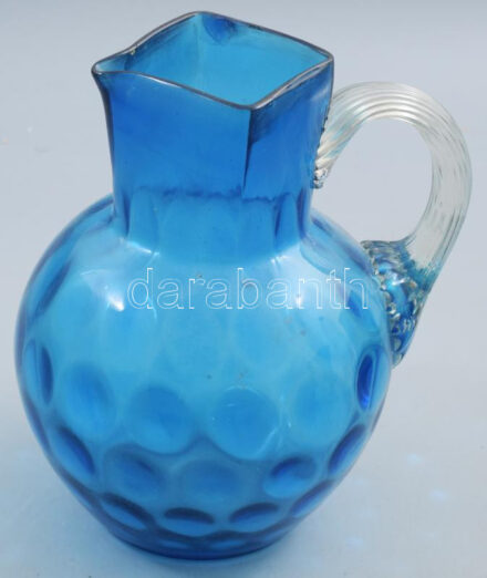 Kancsó. Parád, cca 19. sz. vége, hólyagos hutaüveg, szájánál restaurálással, m: 20 cm /// Jug. Parád, circa late 19th century, blistered factory glass, with restoration at the rim. Height: 20 cm