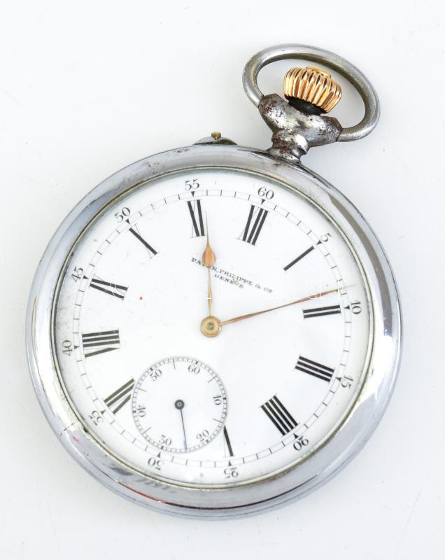 Patek Philippe nyitott zsebóra. Jelzett számlap, jelzett szerkezet, szerkezetszám: 144541 Későbbi fém tokban. Működő, jó állapotban. d: 50 mm. / Patek Philippe open pocket watch marked dial, marked movement, movement number: 144541. In later metal case. Working, in good condition. d: 50