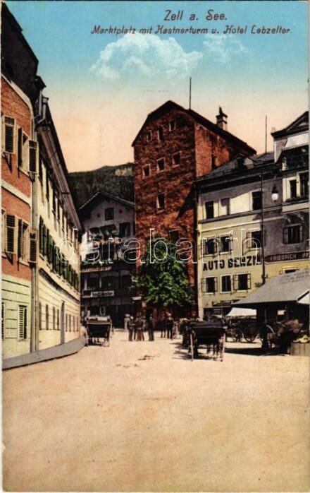Zell am See, Marktplatz mit Kastnerturm und Hotel Lebzelter / market square, tower, Hotel Lebzelter, Auto Benzin