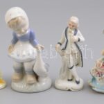4 db porcelán figura, kézzel festett, jelzetlen, egy lepattanással, egyik sérült, m: 11-13,5 cm