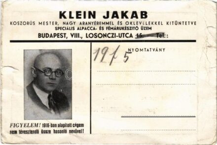 Klein Jakab Koszorús mester, nagy aranyéremmel és oklevelekkel kitüntetve, speciális alpacca- és fémárukészítő üzem reklámja. Budapest, Losonczi utca 15. / Hungarian metalware maker's advertisement (szakadások / tears)
